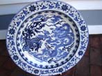 A large 20th century Chinese blue and white Charger with Phoenix and Dragon motif